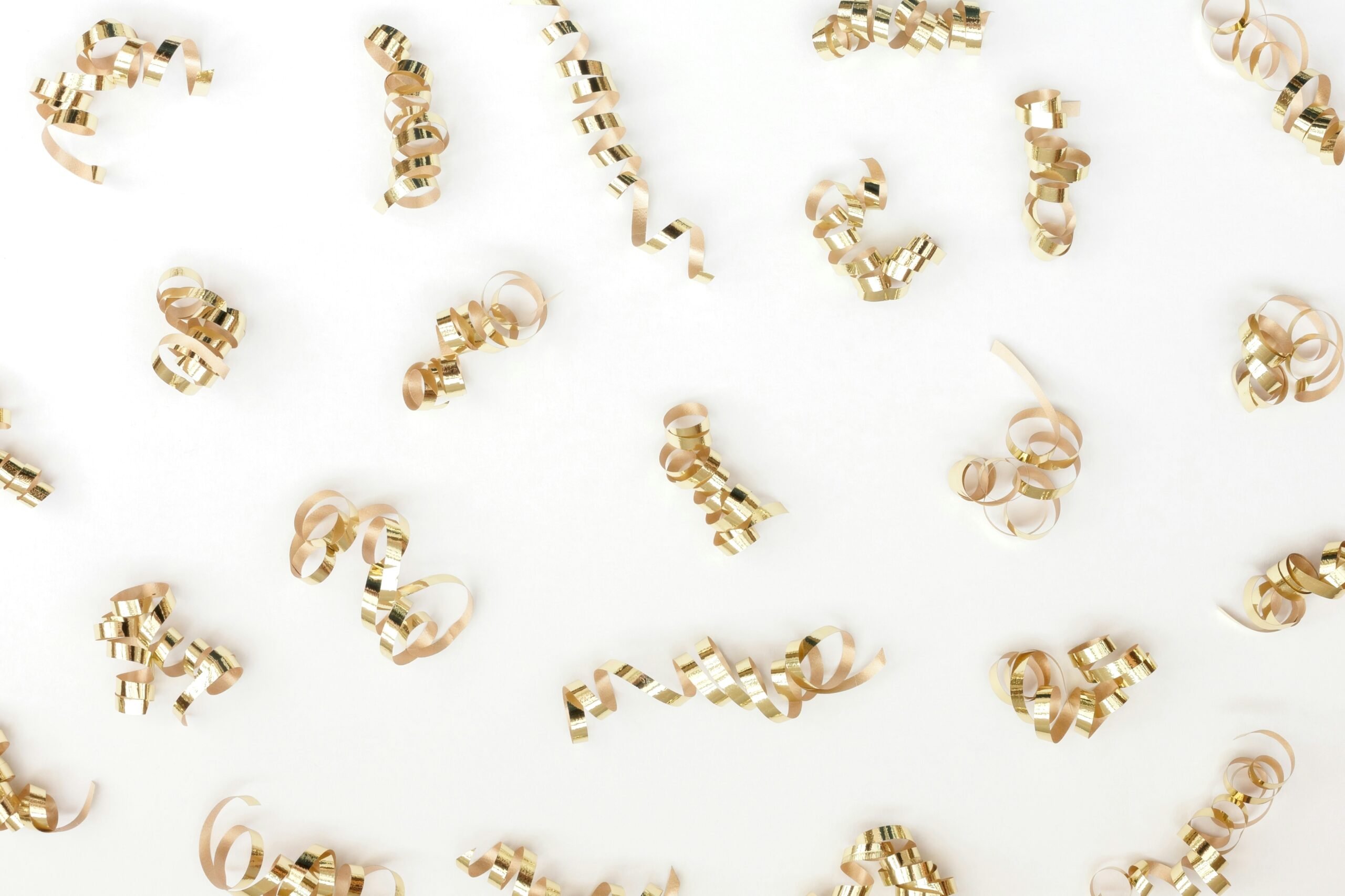 A stunning array of delicate gold and pearl crowns displayed on velvet.