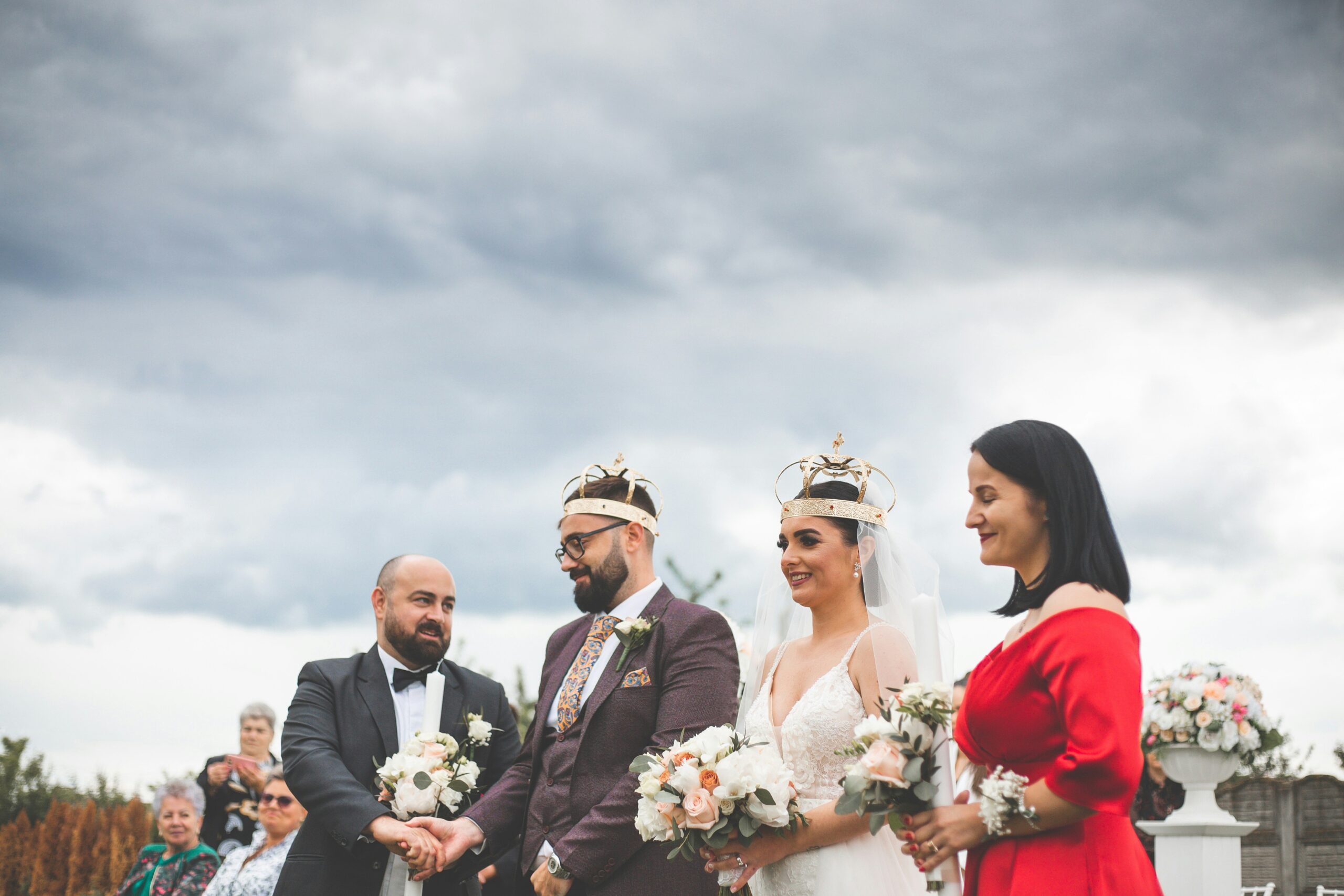 A summer bride wearing a fresh greenery crown paired with braided hair.