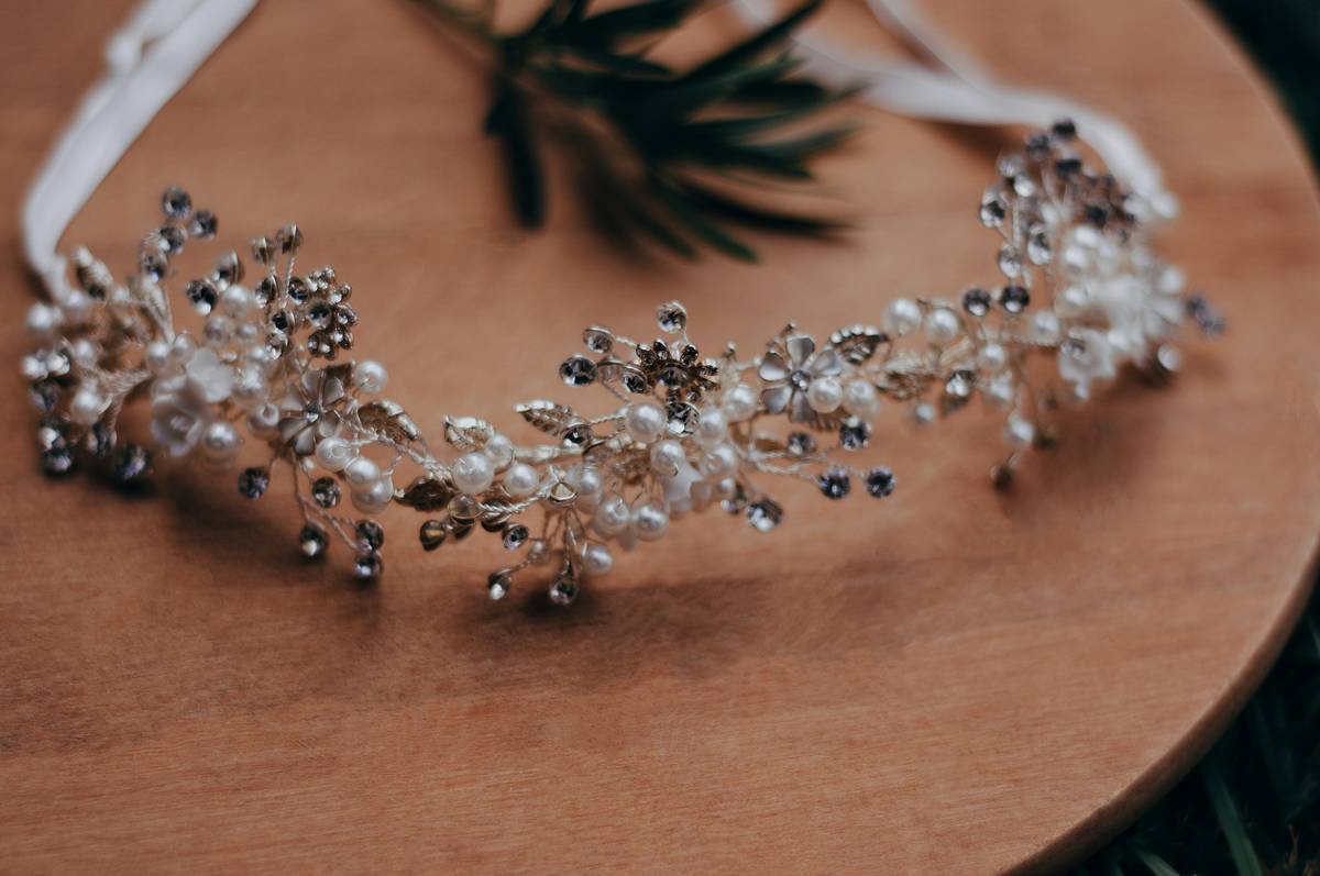 An elaborate pearl tiara adorned with Swarovski crystals